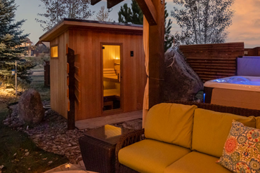 Outdoor sauna by hot tub