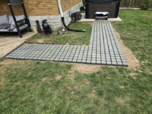 Plastic permeable pavers